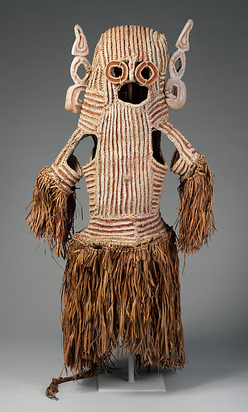 Body mask, Asmat artist, Mulberry fiber, rattan, sago palm leaves, wood, pigment, Asmat people