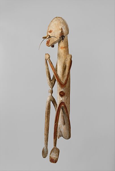 Male ancestor figure, Asmat artist, Wood, paint, sago palm leaves, fibers, mulberry fiber, pig tusk, cassowary quills, hair, coix seed, Asmat people