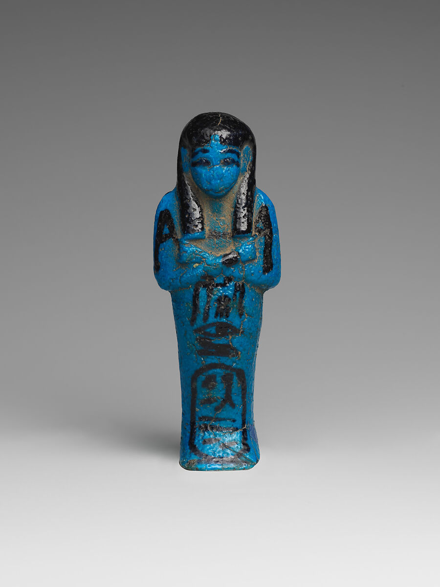Shabti of the Adoratrice of Hathor Henettawy, wife of Painedjem I, Faience 